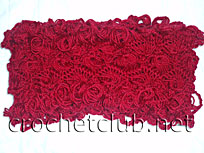 красный шарф связанный на вилке